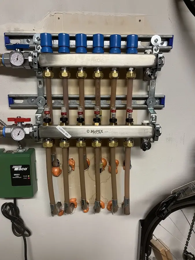 Plumber performing Gas Line Installation at a residential property in Evans